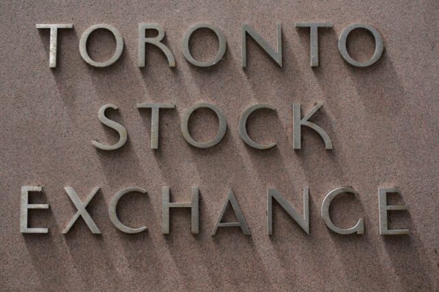 TSX edges higher on commodities boost