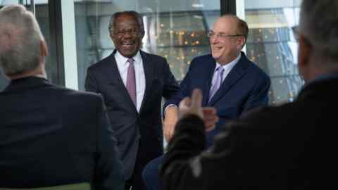 Larry Fink, chairman and chief executive of BlackRock, right, and Adebayo Ogunlesi, chairman and chief executive of Global Infrastructure Partners, during a media interview in New York this month