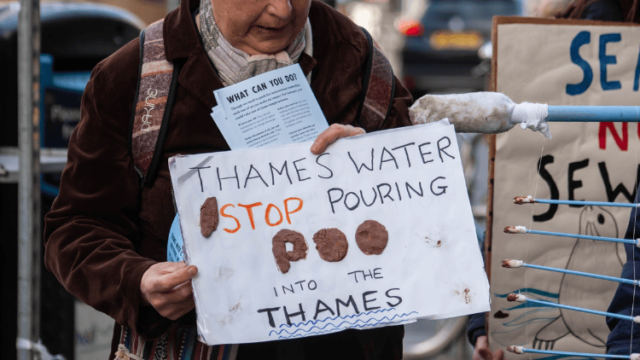 demonstrator against Thames Water pumping sewage into Thames