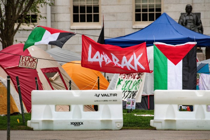 Tents and signs fill Harvard Yard in the Pro-Palestinian encampment at Harvard University