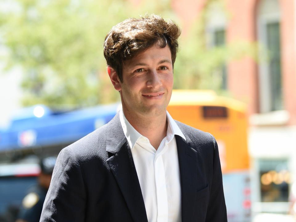 Joshua Kushner, founder and managing partner of Thrive Capital walking down the street in NYC.