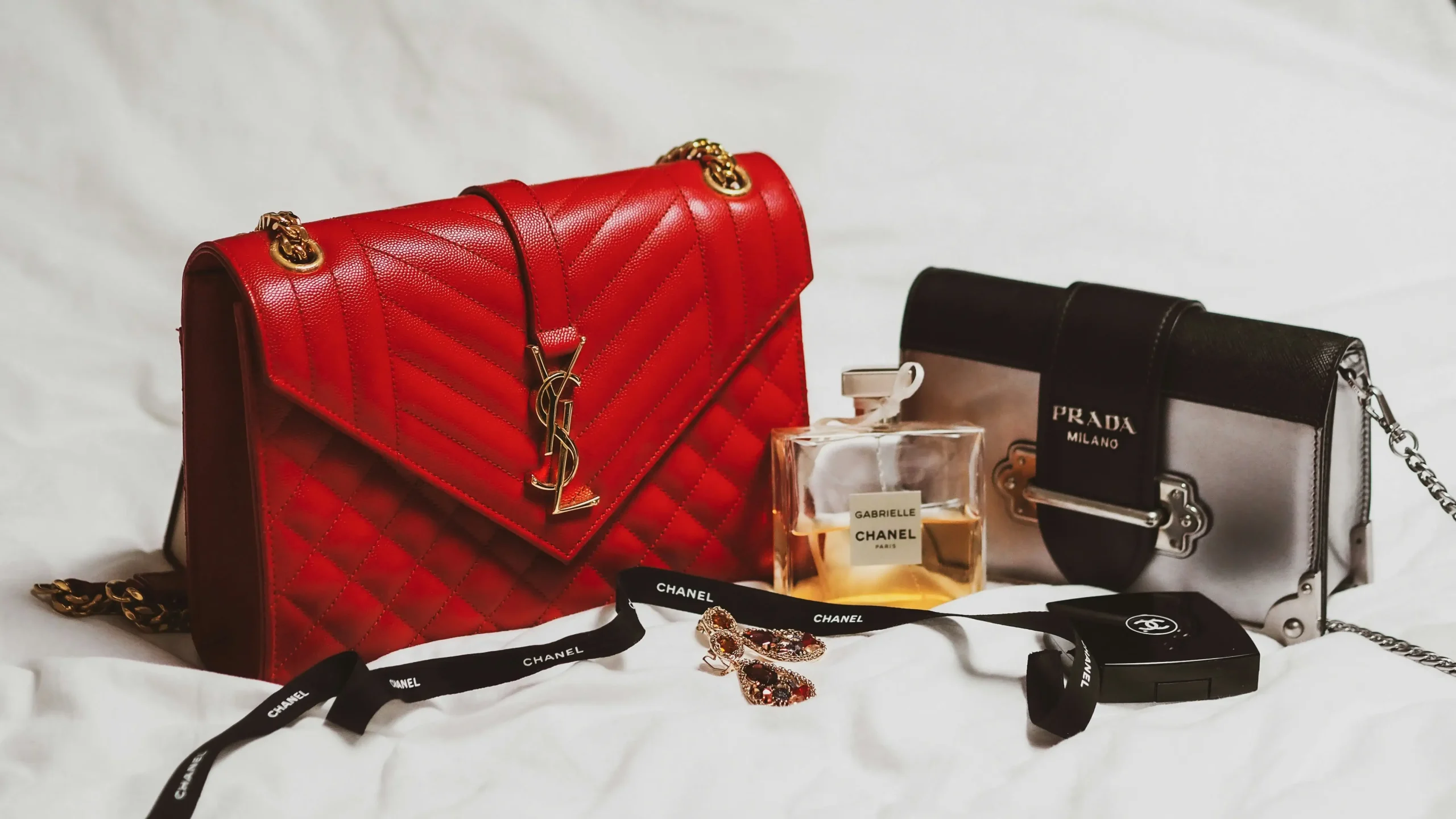 designer handbags luxury items perfume